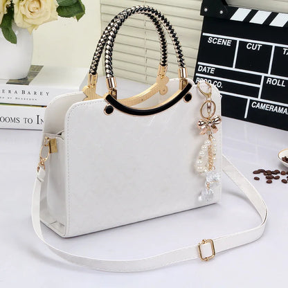 Sac à main en cuir verni avec pendentif perle pour femme