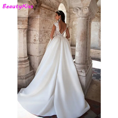 Robe de mariée trapèze Boho avec poches en dentelle, tenue de princesse élégante, col rond, manches cape, en Satin