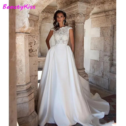 Robe de mariée trapèze Boho avec poches en dentelle, tenue de princesse élégante, col rond, manches cape, en Satin