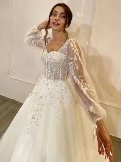 Robes de mariée en dentelle simple, appliques en tulle à manches longues, robe longueur au sol