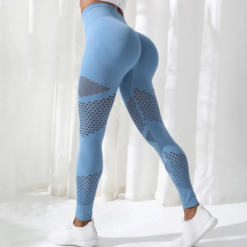 Pantalon de yoga taille haute sans couture à rayures creuses pour femmes