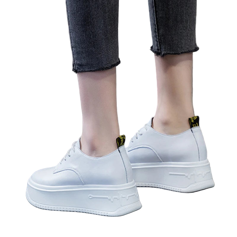 Baskets à semelle compensée en cuir véritable pour femmes