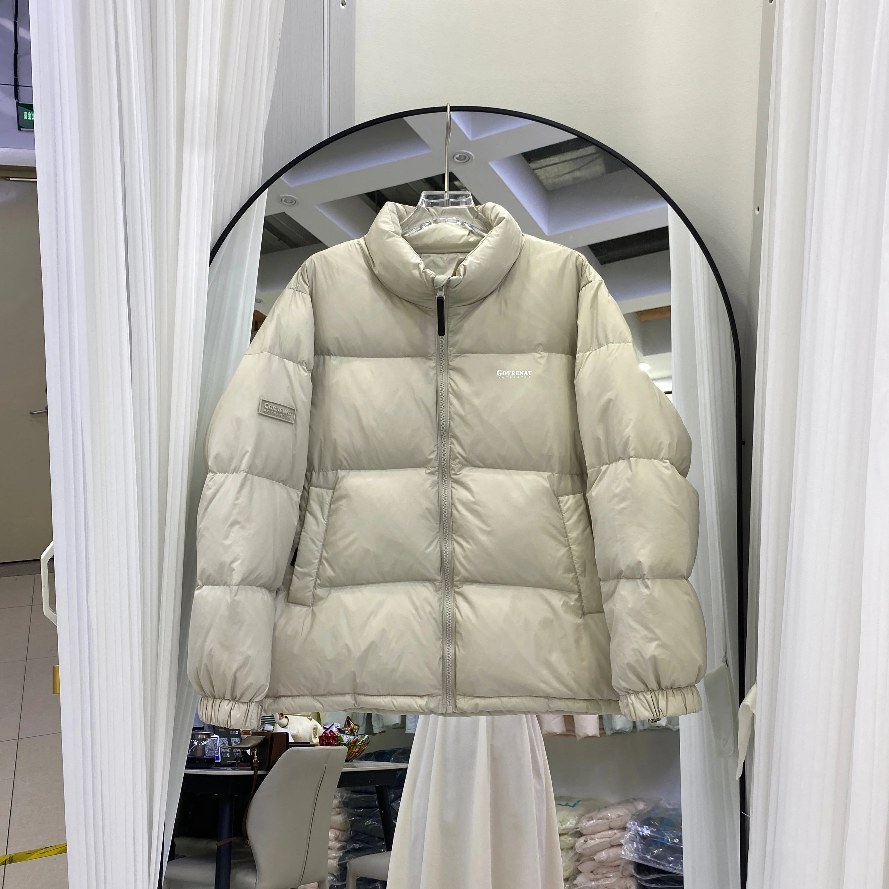 Doudoune courte et ample à col vertical pour homme et femme