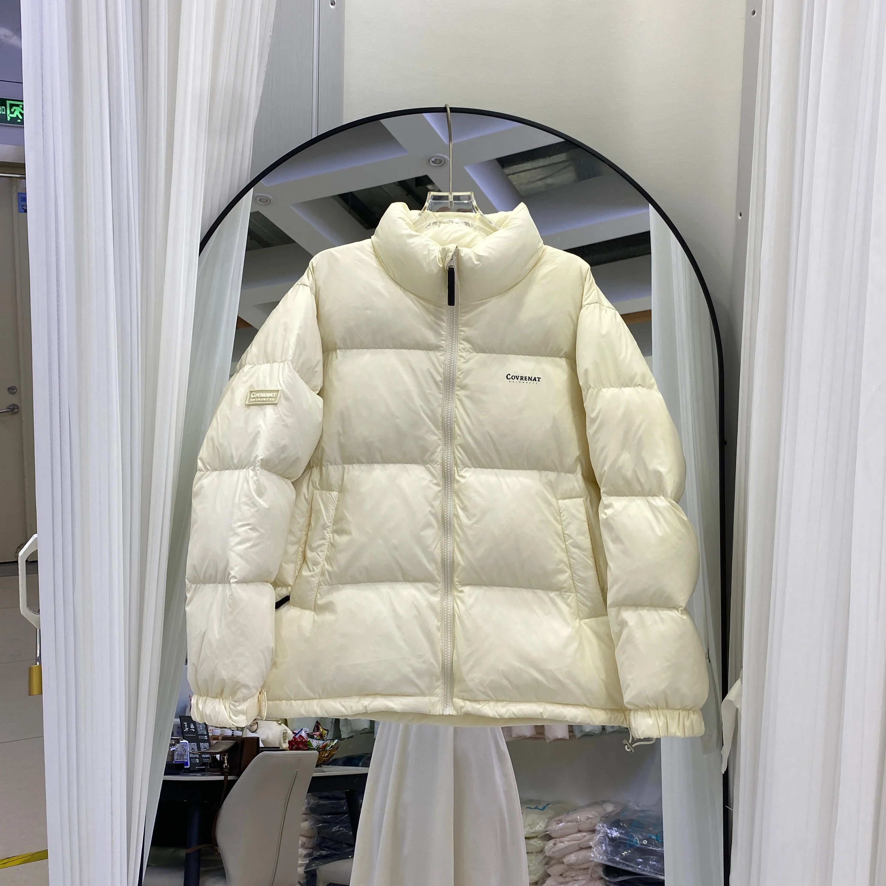 Doudoune courte et ample à col vertical pour homme et femme