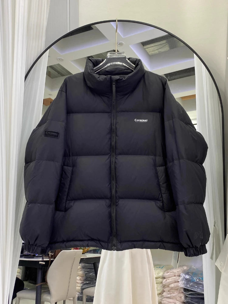 Doudoune courte et ample à col vertical pour homme et femme