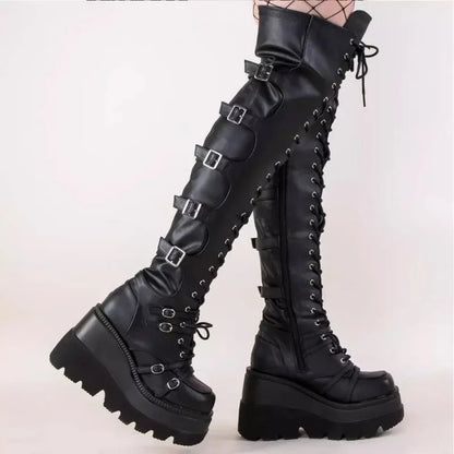 Bottes boucles plate-forme compensées talons hauts