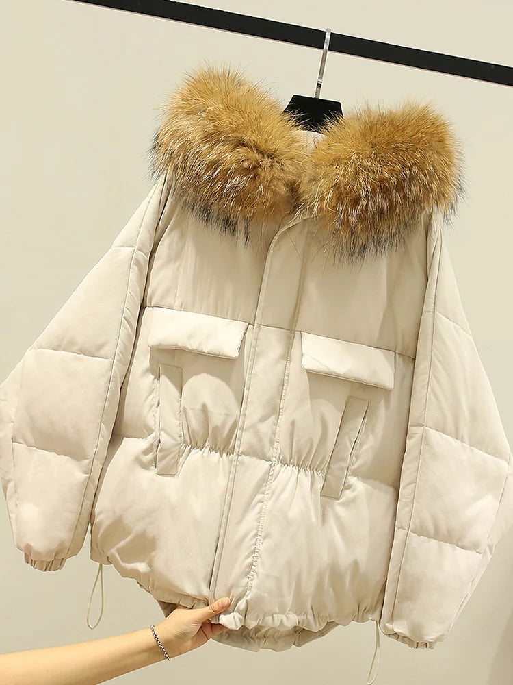 Manteau vraie fourrure de raton laveur à capuche pour femmes