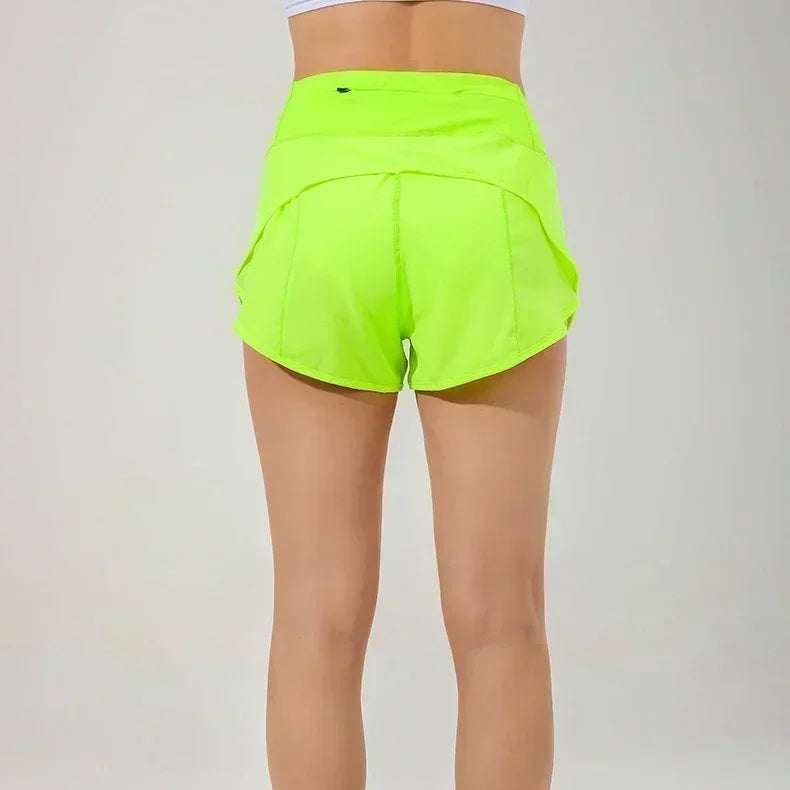 Short Speed Up pour femme  avec poches zippées dans le dos,