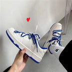 Baskets de course bleues à lacets pour femmes