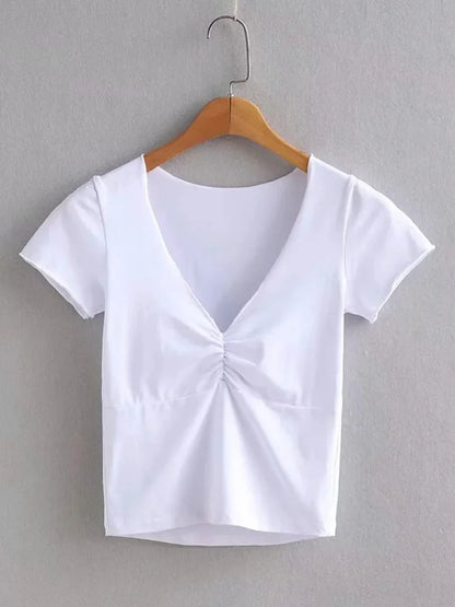 T-shirt ajusté doux et extensible à col en V pour femme avec une couture sous la poitrine