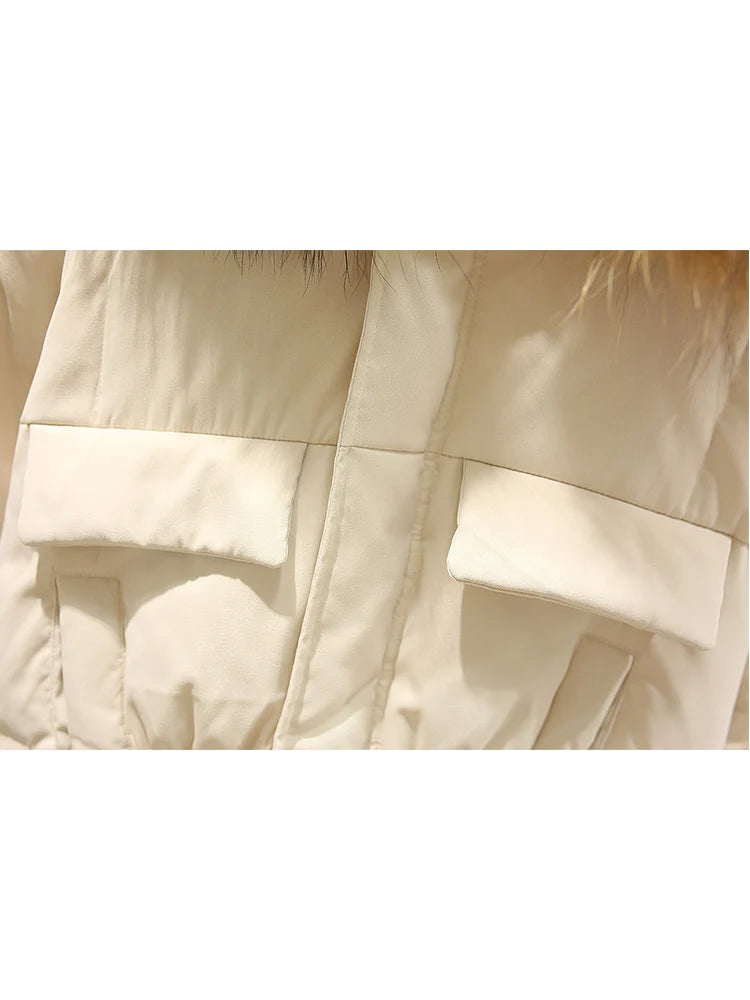 Manteau vraie fourrure de raton laveur à capuche pour femmes