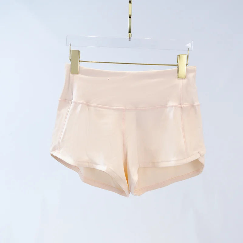 Short doublé mi- taille à séchage rapide avec cordon de serrage à la taille pour femmes