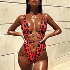 Maillot de bain une pièce à col en V profond et coupe haute pour femmes