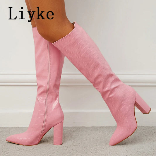 Bottes hautes mode rose serpent imprimé talons carrés