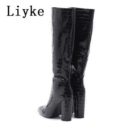 Bottes hautes mode rose serpent imprimé talons carrés